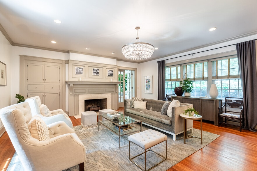 Stunning light filled living room opens to 4 season room - 4061 Beechwood Ave