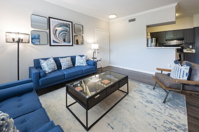 Building Photo - Live Large, Save Larger