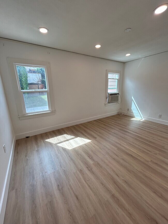 Bedroom #2 with view of private backyard - 1139 S Highland Ave