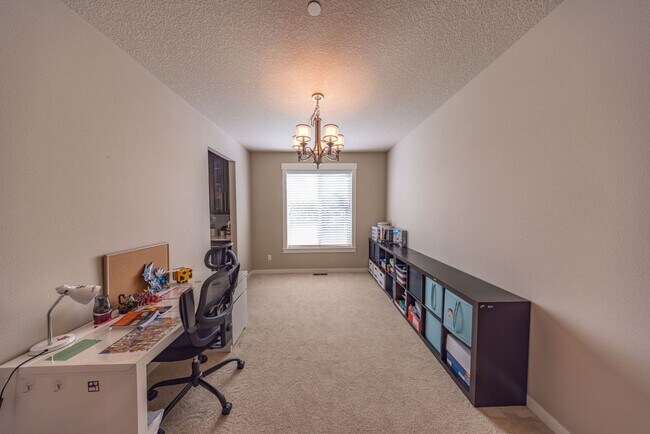 Building Photo - Four Bedroom Home + Bonus & Den in Gated C...