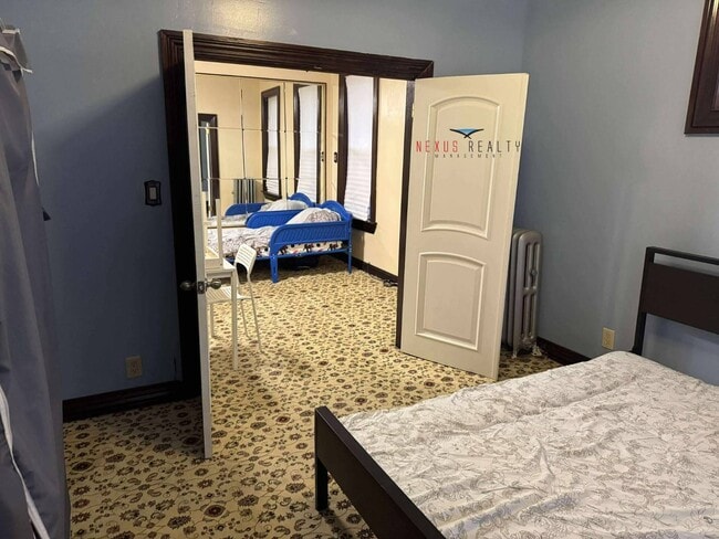 Building Photo - 26-28-28 96th St