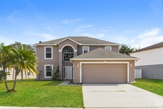 Building Photo - 5-Bedroom Home with Enclosed Pool