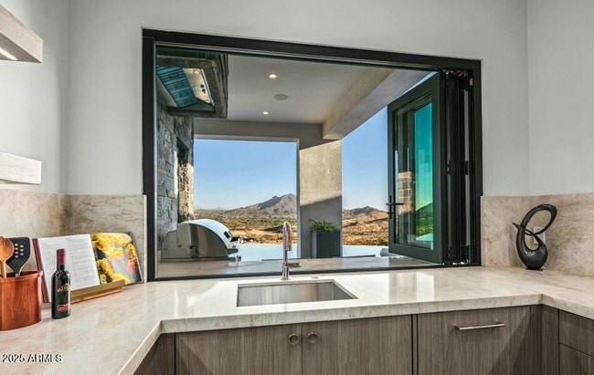 Building Photo - 4880 E Lone Mountain Rd N