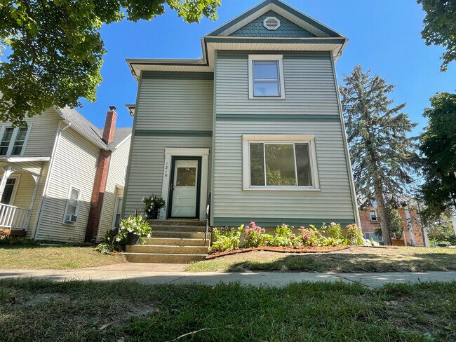 Front of the house with plants that will be upkept - 1219 State St