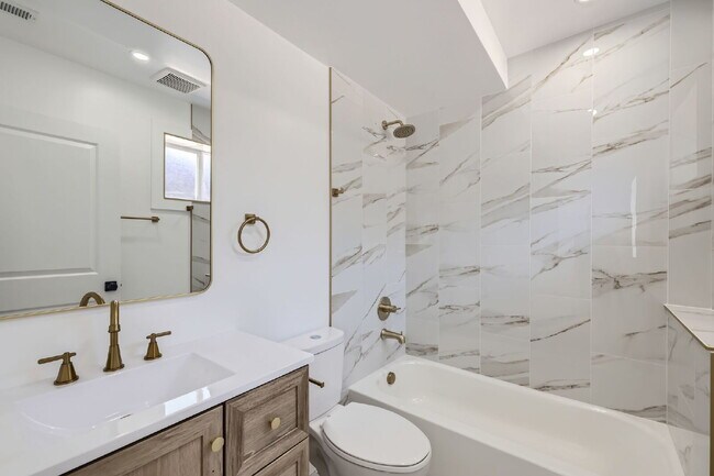 Building Photo - Renovated Duplex with Private Entrance