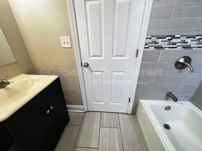 Building Photo - 7642 S Normal Ave