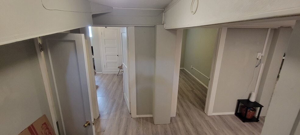 Another view of the lower level from the bottom of stairs. Door to furnace and bonus room on the far - 814 Atchison Ave