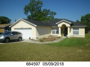 Building Photo - THREE BED TWO BATH TWO CAR GARAGE.