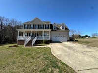 Building Photo - Beautiful 3 bedroom home on over 3/4 acres with huge garage.