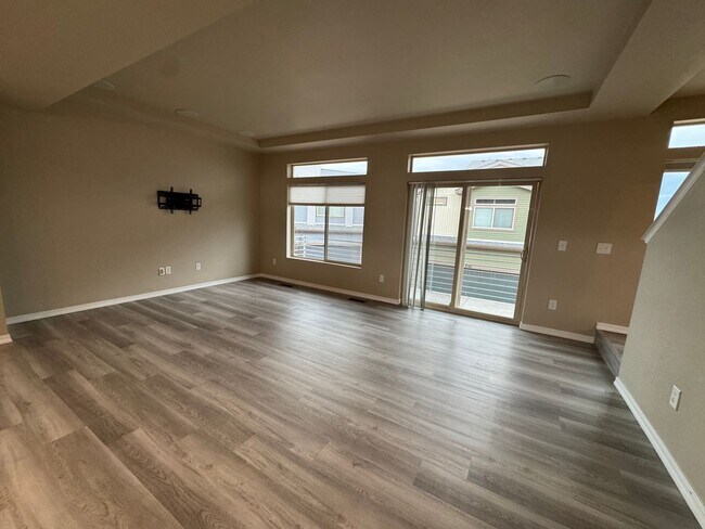 Building Photo - Modern 3-Story Corner Lot Home with Hot Tu...