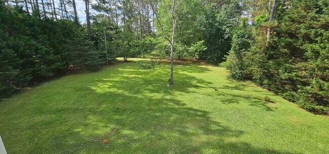 Building Photo - Commanding Curb Appeal, Conveniently Place