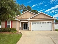 Building Photo - Woof and Meow Friendly! 4/3 with a fenced in yard!