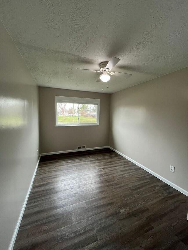 Building Photo - Spacious 3-Bedroom Ranch with 2-Car Garage & Oversized Fenced Backyard