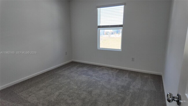 Building Photo - 10722 NW Moon Rise Ln