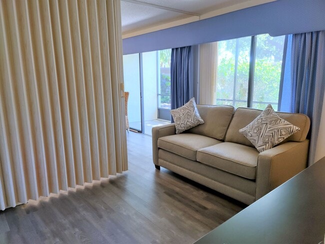 Building Photo - Bird Bay Village Annual Rental – Furnished 1st Floor Unit with Covered Parking