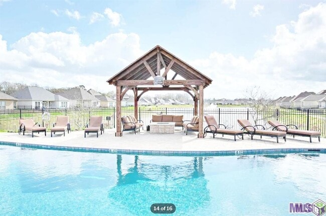 Building Photo - 3 Bedroom House in Gated Community| Community Pool