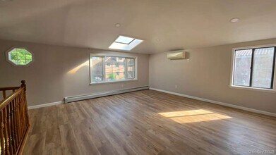 Building Photo - 206-66 46th Ave