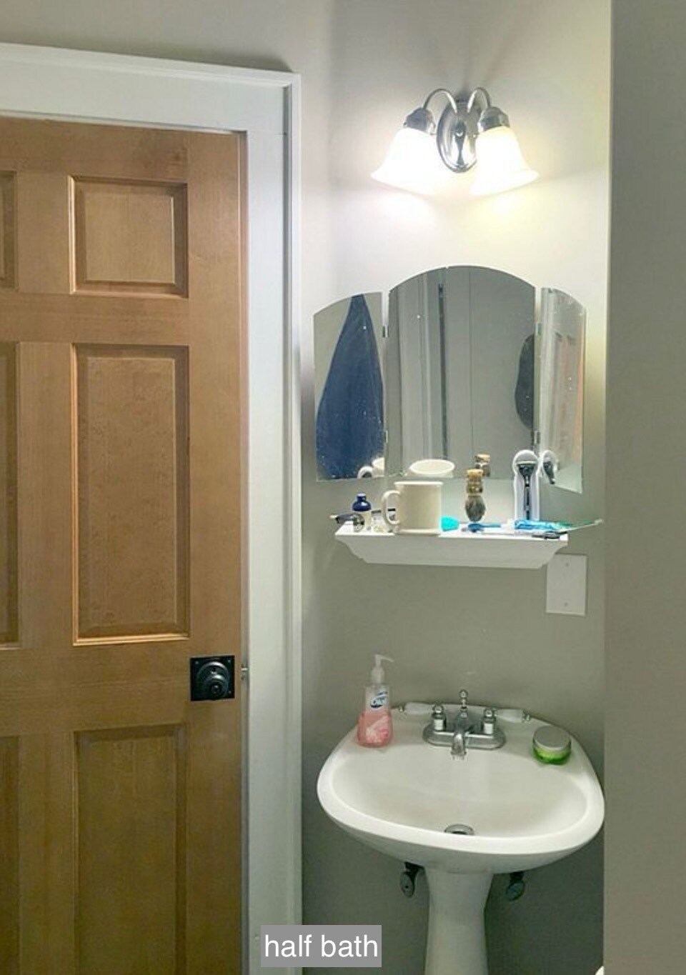 half bathroom off of kitchen and bedroom 4 - 631 N Garden St