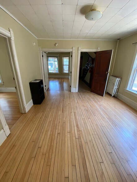 Dining Room with View of Living Room and Front Entry - 415 W Doty St