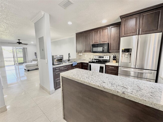Building Photo - 10991 NW 30th Pl