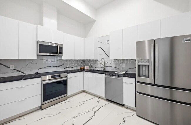 Building Photo - 6982 W 22nd Ave