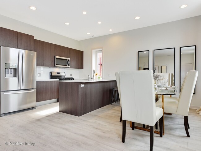 Kitchen Overlooking Dining Space - North Oak Lofts