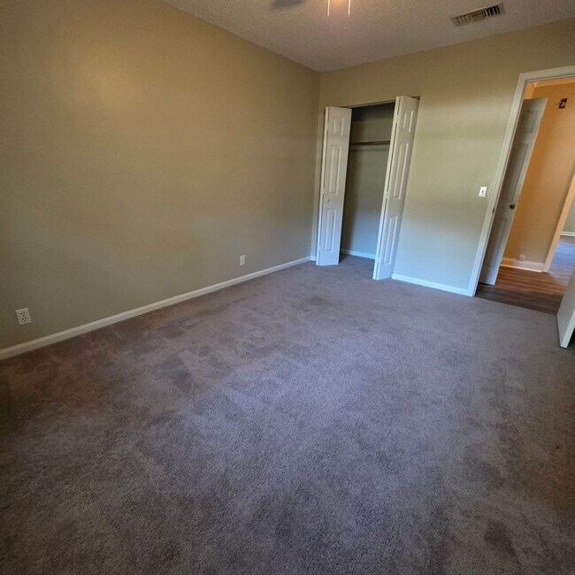 Building Photo - Corner Lot Charm: Spacious 4 Bed on Corner Lot w/ Custom Bookshelves & Private Storage Shed