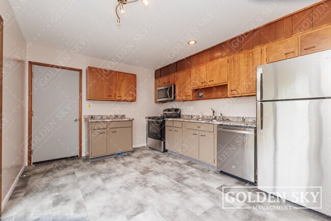 Building Photo - 3129 S Opechee Dr