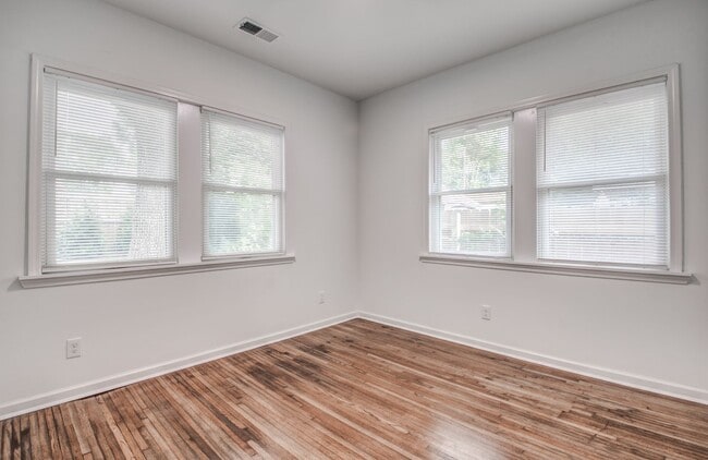 Building Photo - Live Stylishly. Live Comfortably. Live Mem...