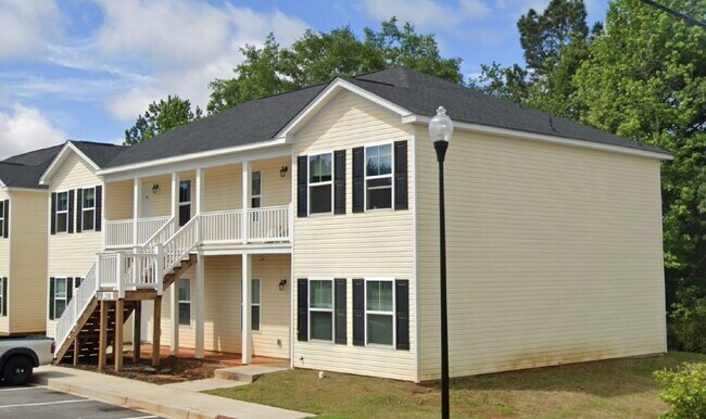 Building Photo - Sign a 12-month lease now and receive the ...