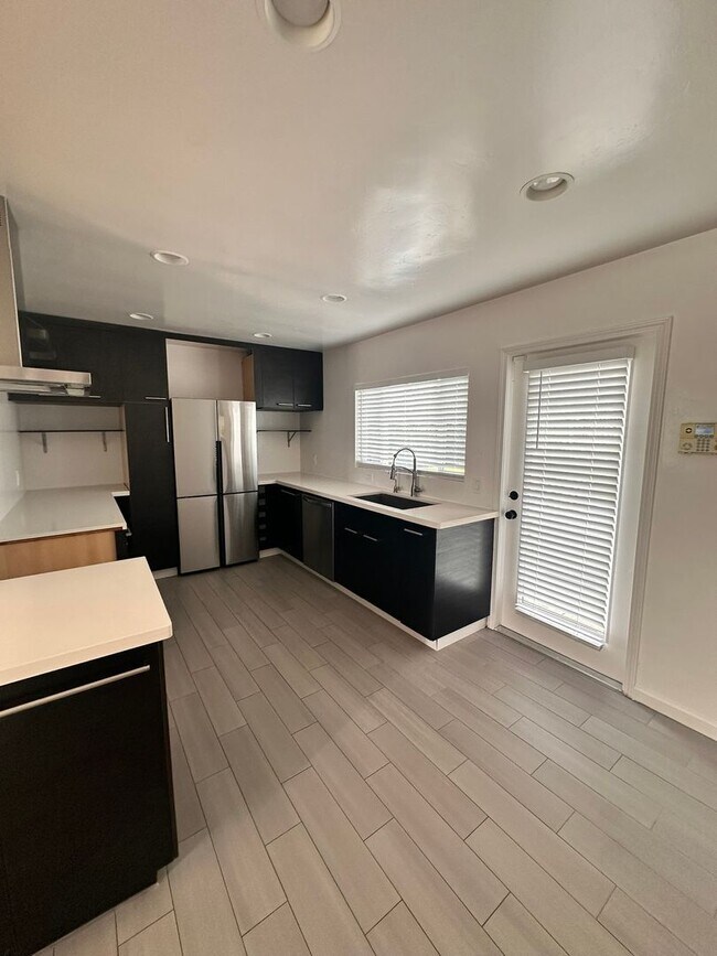 Building Photo - Don't miss out - Single family home close to the beach - LARGE yard, 2 bed 1 bath with bonus studio