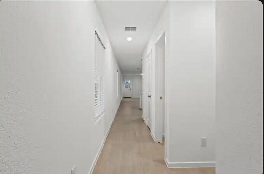 Entrance long hallway - 726 Sandhill Crane Ln