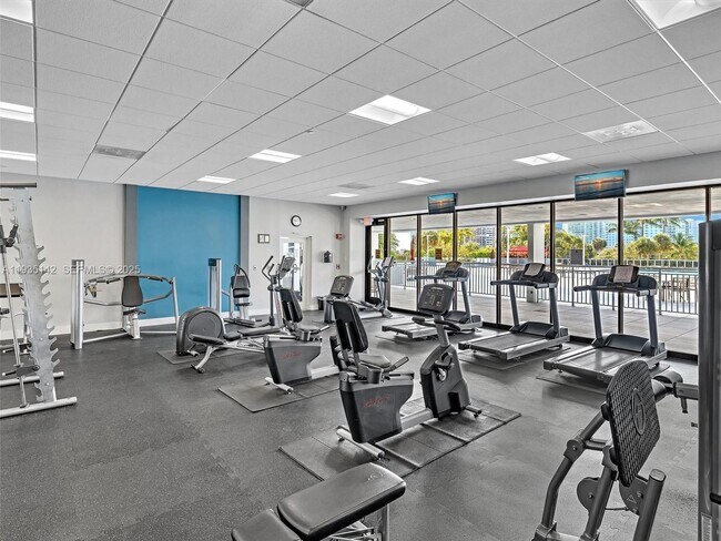 Building Photo - 3675 N Country Club Dr