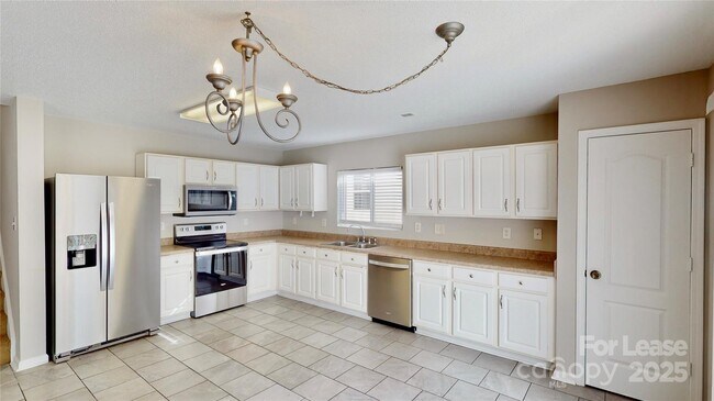 Building Photo - 8139 Deodora Cedar Ln