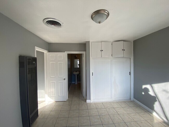 Building Photo - Hard to Find 1 BD 1 BA House with a 2 car garage and it's own yard.