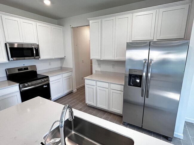 Building Photo - Brand New 4/3.5 Two Story Home with Loft. ...