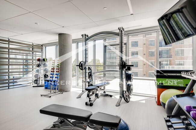 Building Photo - Modern Condo with Washer/Dryer and Central AC