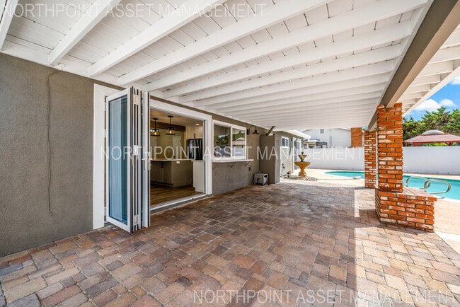 Building Photo - Brand New Remodel – Stunning Pool Home wit...