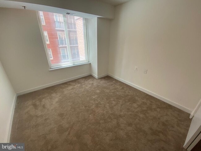 Building Photo - 7500 Woodmont Ave
