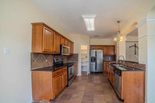 Building Photo - "Spacious 4-Bedroom Retreat with 2.5 Baths...