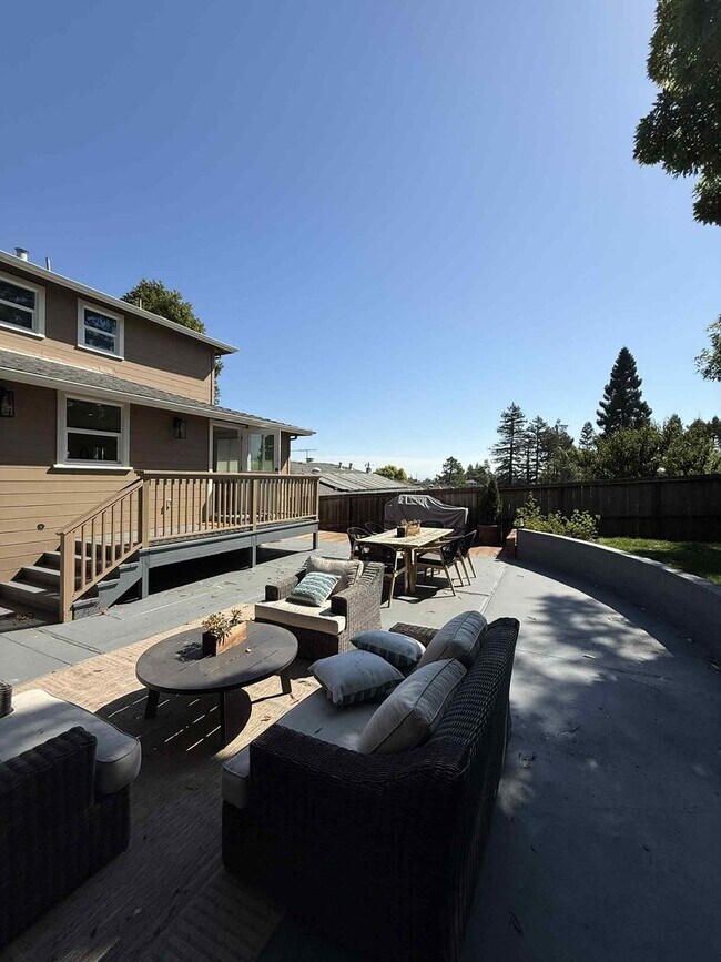 Building Photo - Modern 4-Bedroom Retreat in San Carlos – Remodeled, Spacious, Private Yard