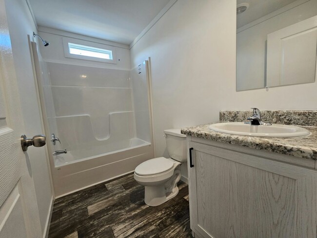 Building Photo - 6681 Hidden Oaks Dr