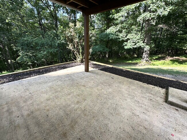 Building Photo - 3-Bedroom Split Level in Peaceful Wooded Setting