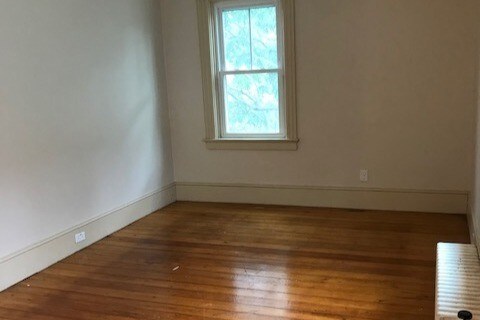 Living room off dining area. - 15 Congdon Ave