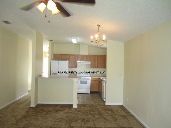 Building Photo - 7493 International Village Dr