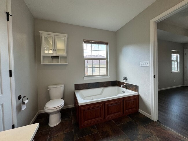 Building Photo - Well Maintained 4 Bedroom with a Privacy F...