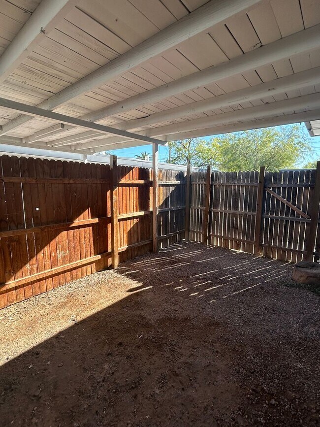 Building Photo - Two Bedroom w/ A/C, Yard and Carport