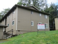 Building Photo - Upstairs Two Bedroom Apartment with Garage