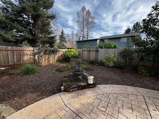 Building Photo - Charming 3 Bedroom Home with Beautiful Backyard & RV Parking