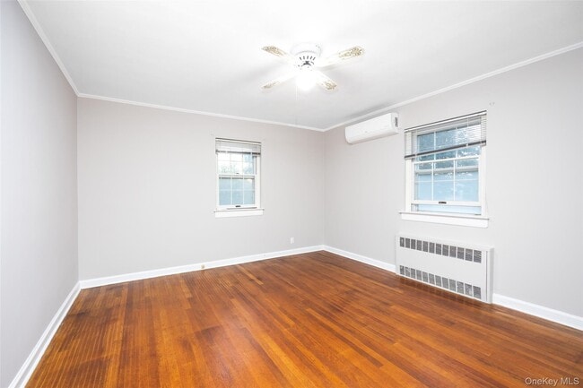 Building Photo - 145-53 7th Ave